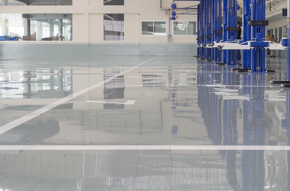 Epoxy flooring used in an auto repair shop